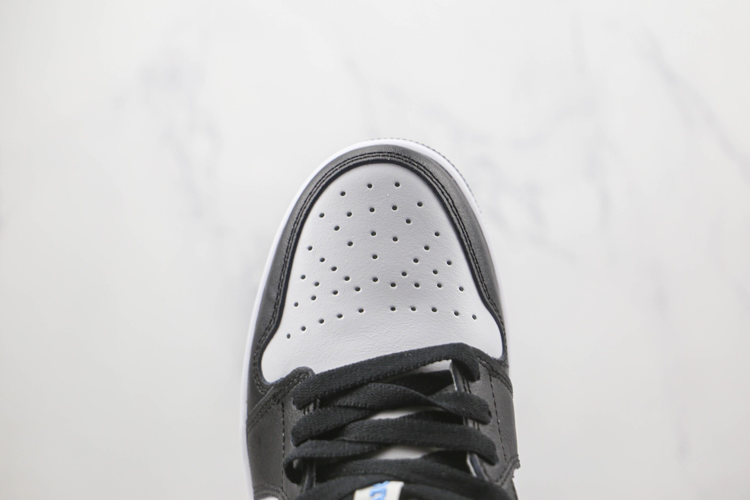 Jordan 1 Low Black University Blue White - Imagem 3