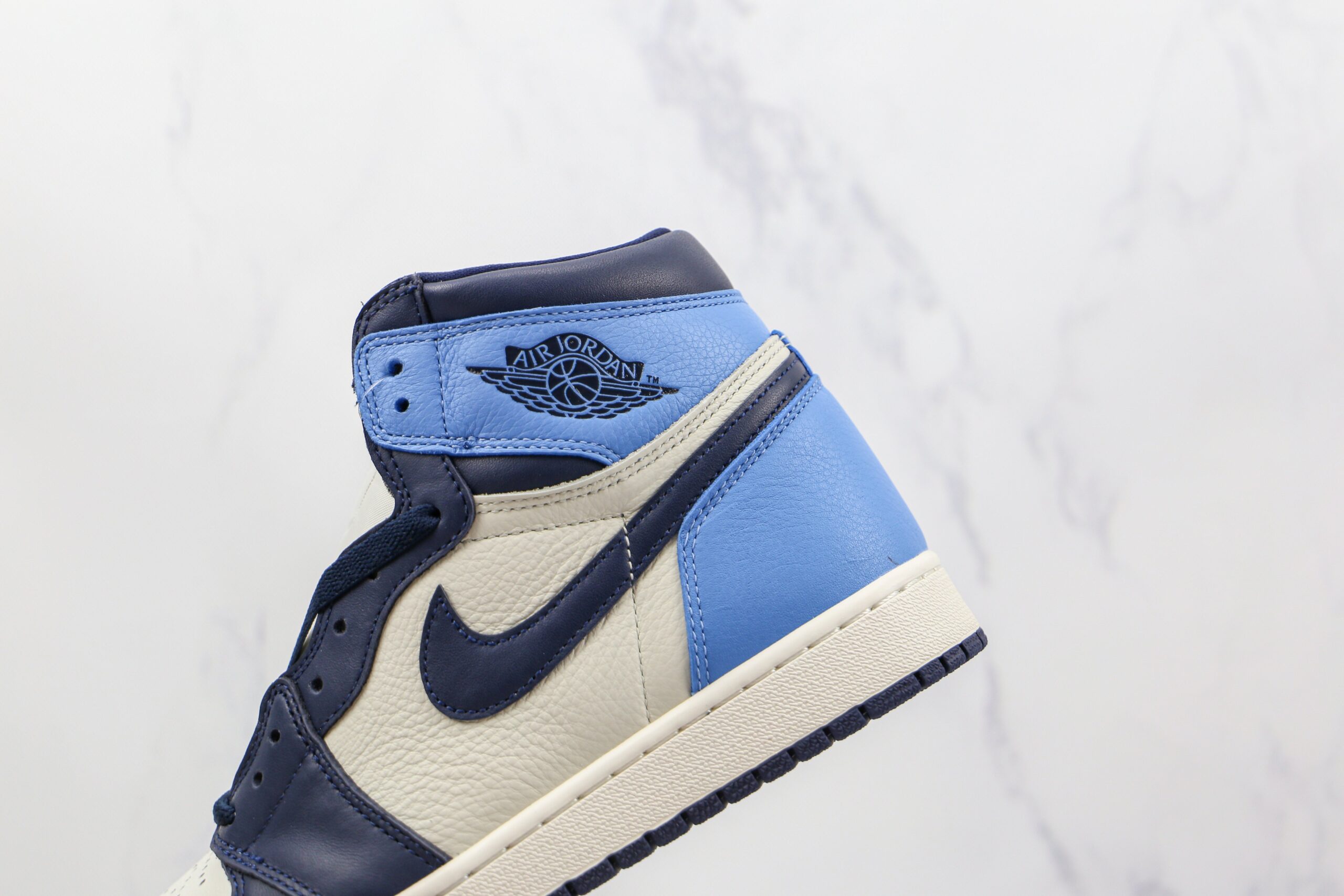 Jordan 1 Retro High Obsidian UNC - Imagem 7