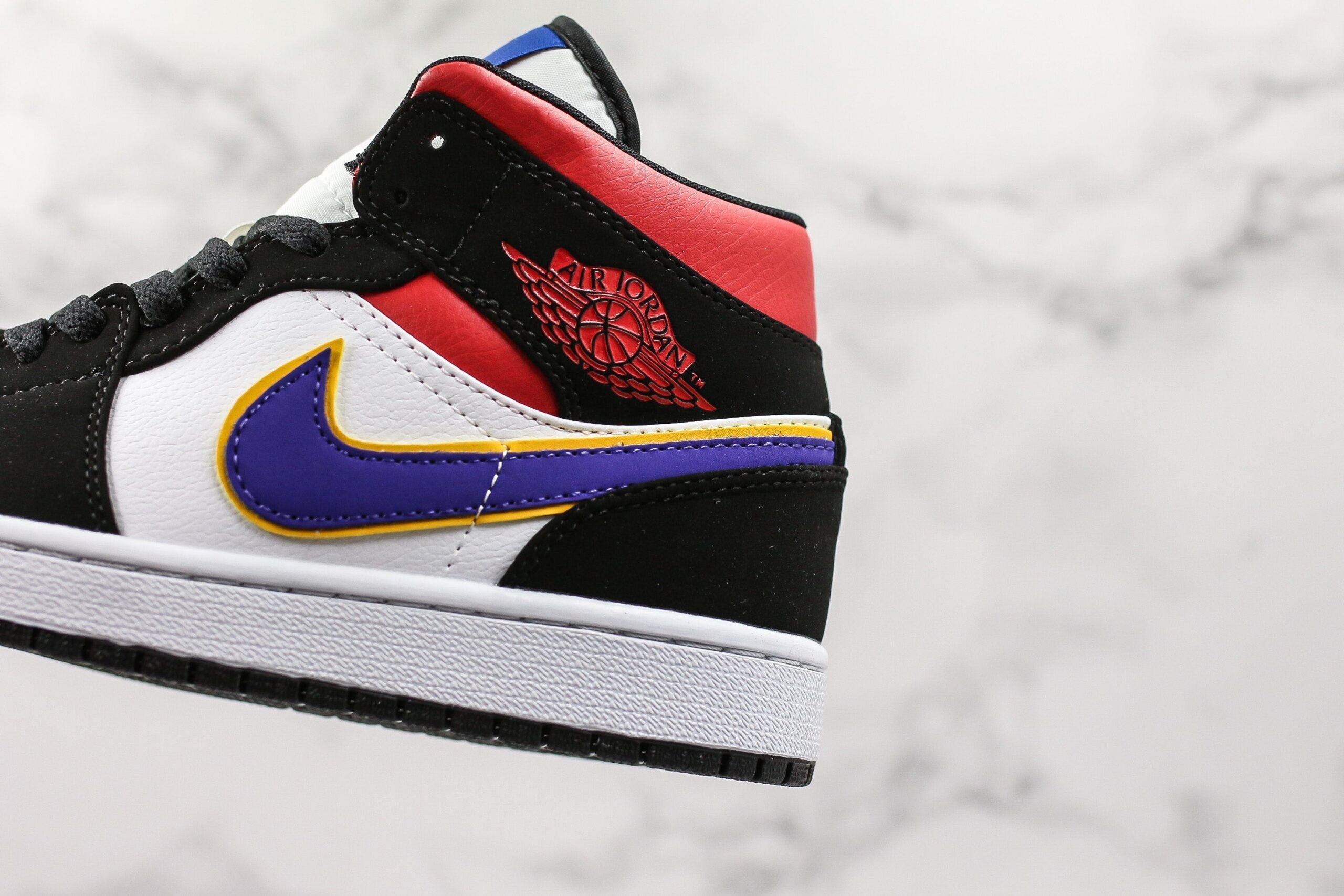 Jordan 1 Mid Lakers Top 3 - Imagem 3
